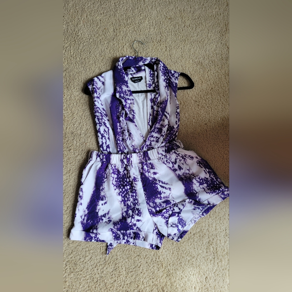 bebe Bold Bloom Romper - A Splash of Purple Elegance